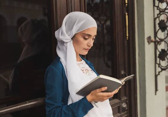 Young muslim woman reading Young muslim woman reading